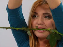 Елена с розой во рту